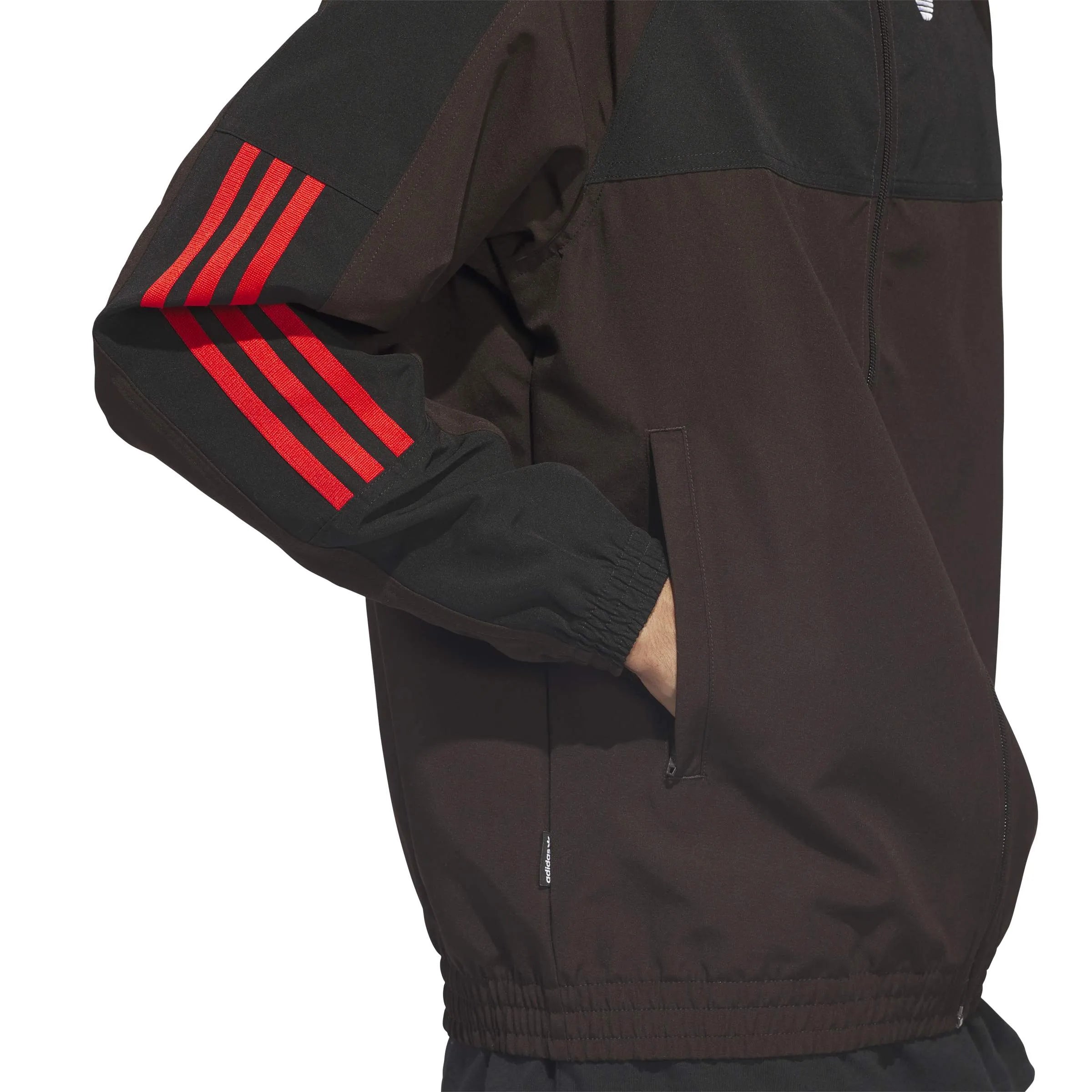 Vestes Adidas-Gatsele Trk Jkt-Aurora Coffee, vue portée détail bas de veste